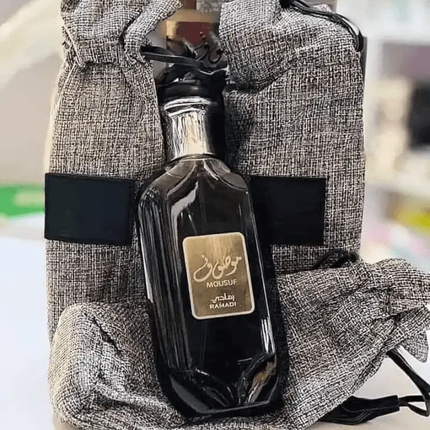 عطر موصوف رمادي للرجال من ارض الزعفران سعة 100 مل - Genie Perfume Shop #